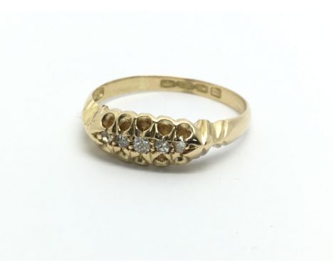 A vintage 18ct gold five stone diamond ring, approx 2.9g and approx size O.