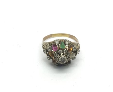A 14ct gold multi gemstone style ring, approx 4.2g and approx size T.