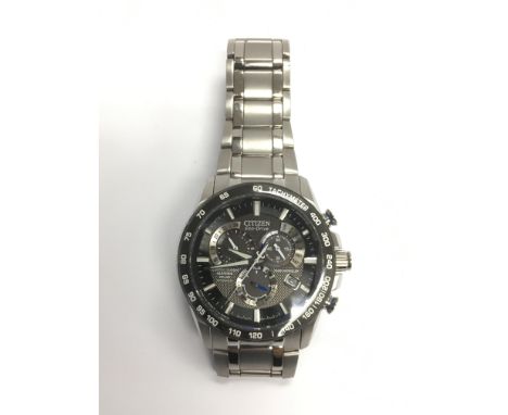 A gents Citizen Eco drive titanium watch.