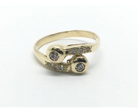 A 14ct gold eight stone diamond ring, approx 2.7g and approx size K.