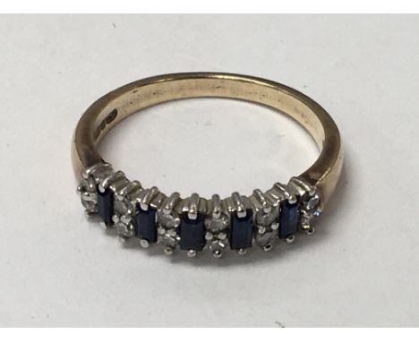 A 9carat gold ring set with blue sapphire and small diamonds ring size M - NO RESERVE