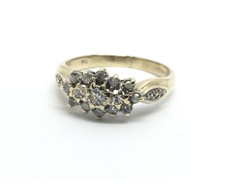 A 9ct gold diamond cluster ring, approx .33ct, approx 2.4g and approx size O-P.