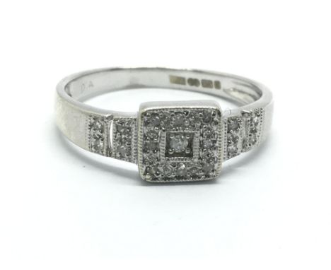 An 18ct white gold diamond cluster ring of squared form, approx 2.7g and approx size P.