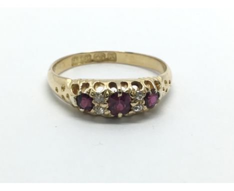 A vintage ruby and diamond ring, approx 2.7g and approx size M.