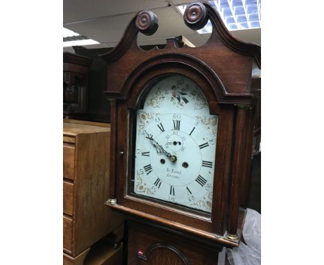 A 19th century Early Victorian oak longcase clock with a painted dial maker In Lamb Spilsby With a pendulum and weights.