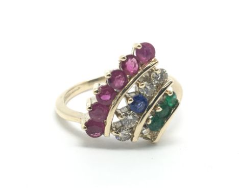 A 9ct gold 'fan style' multi stone ring, approx 2.6g and approx size L-M. Missing one stone.