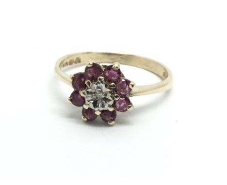 A 9ct gold ruby and diamond ring, approx 1.7g and approx size M-N.