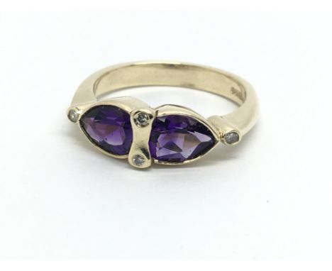 A 9ct gold amethyst and diamond ring, approx 3.2g and approx size L- M.