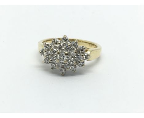 An 18ct gold diamond cluster ring, approx.54ct, approx 4.5g and approx size K.