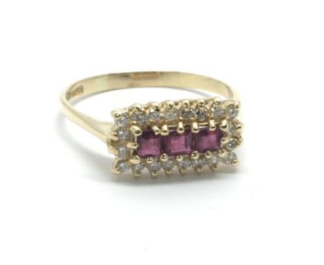 An 18ct gold ruby and diamond ring, approx.33ct, approx 3.2g and approx size Q-R.