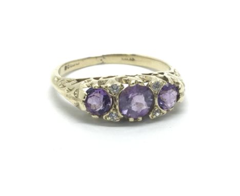 A 9ct gold amethyst and diamond ring, approx 2.2g and approx size M-N.