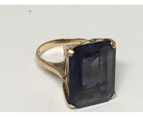 A 14 Carat gold ring set with an Alexandrite type stone ring size J.