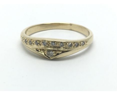 A 14ct gold diamond ring set with small diamonds, approx .15ct, approx 2.6g and approx size N-O.