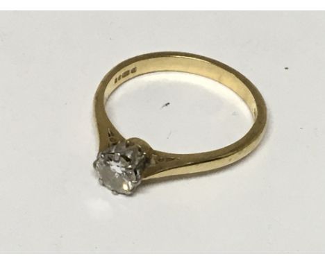 An 18carat gold ring inset with a solitaire diamond approximately 0.45 of a carat ring size O.