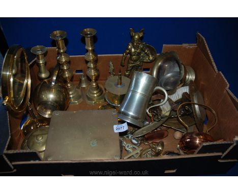 A quantity of brass including candlesticks, trench art, tea caddy, crumb tray, horse brasses, button guards, Viking figure et