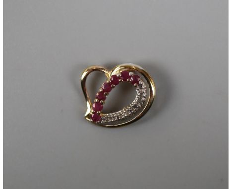 Gold ruby and diamond set pendant 