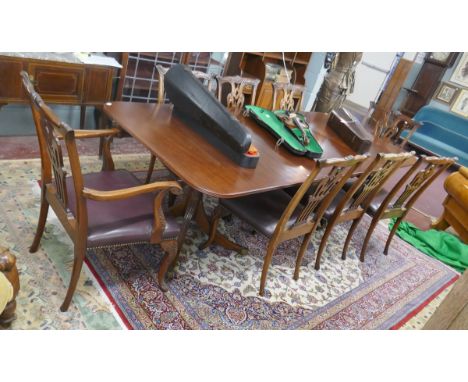 Mahogany extending dining table with set of 8 Chippendale style chairs 