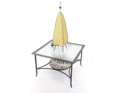 A cast iron square occasional table, inset textured glass, raised on square slender tapering legs, united by curved stretcher