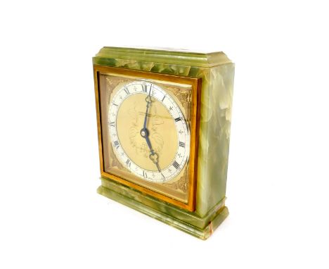 An Elliott green onyx cased mantel clock, square brass dial with cherubs head spandrels, silver chapter ring bearing Roman nu