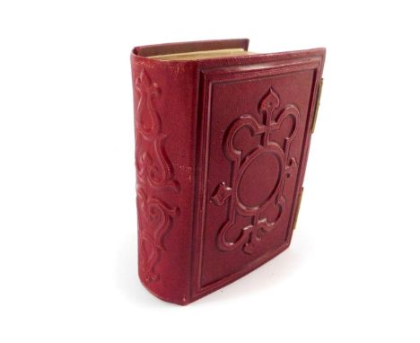 A Victorian red leather album of Carte de Visite, portrait photographs, photos of Venice, etc. 