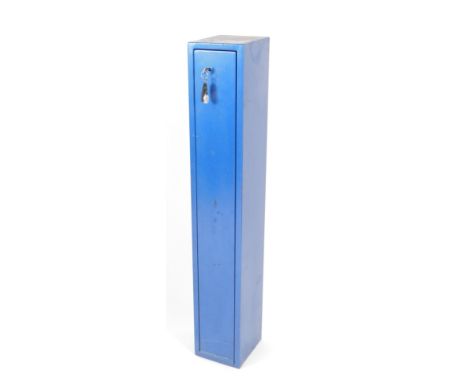 A blue metal gun cabinet, 125cm H, 20.5cm W, 23cm D.