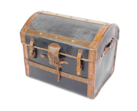 A vintage dome top cabin trunk, with wooden slats to the top, leather binding and lock cover, 50cm H, 69cm W, 57cm D.