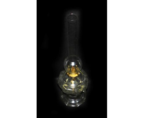 A Victorian clear pressed glass oil lamp, with a glass chimney, 57cm H.