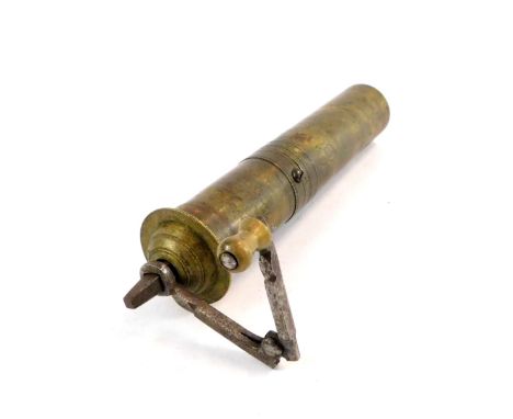 A Turkish vintage brass coffee grinder, with cast iron handle, 24cm H.