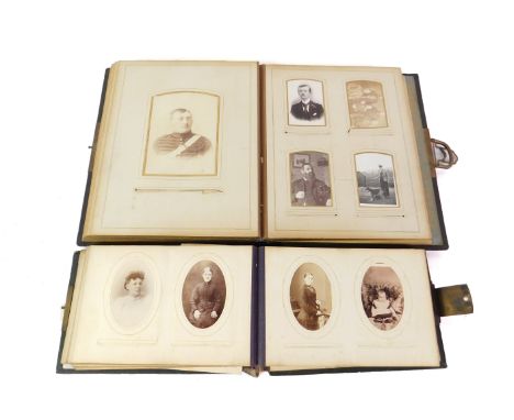 Two Victorian albums of portrait photographs, and some later photographs.