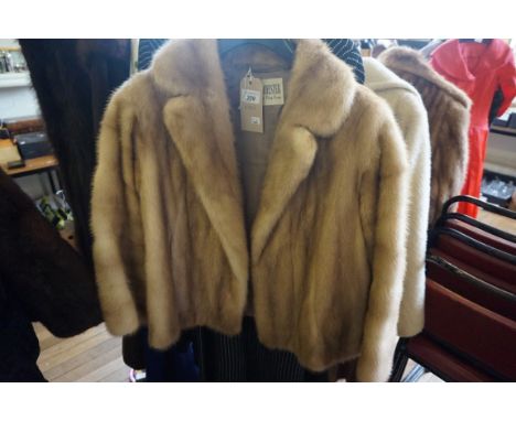 A Ladies blonde mink fur jacket, with light brown floral silk lining 