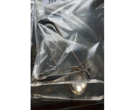 A collection of hallmarked silver and silver-plated items to include a silver caddy spoon, two Victorian sugar tongs, etc.