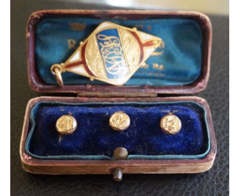 A set of three mother of pearl Masonic studsTo original box, together with, an 18ct gold and enamel medallion, inscribed and 