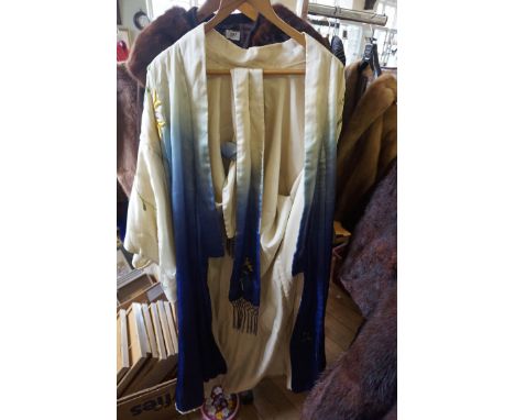 An Oriental silk embroidered gown, the silk a white to navy blue ombre, with embroidered chrysanthemums, with matching waist 