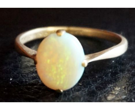 An opal ringTo 9ct stamped shank, weight 2g