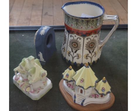 A mixed collection of ceramic items to include a Wedgwood Jasperware mantel clock, two Coalport pastille burners to include r