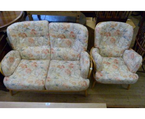 An Ercol light beech two piece suite.