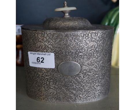 A stylish Victorian silver-plated tea caddy, of oval form having cast floral decoration.