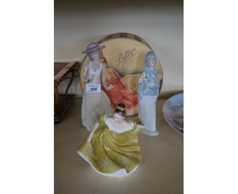 A Lladro Nao and Royal Doulton figurine to include HN2329 Lynn, also a vintage Bettys advertising box.