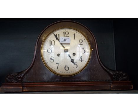 An early 20th Century mahogany veneered Napolean's hat mantel clock.