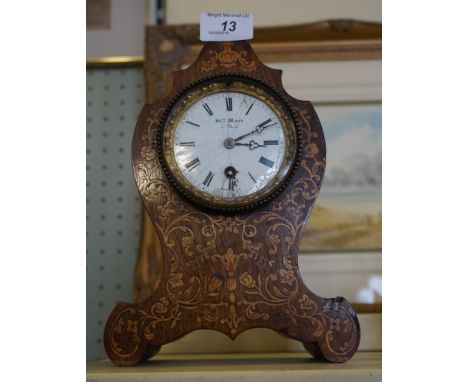 A beautiful 19th Century French marquetry inlaid rosewood cased mantel clock, the enamelled dial bears the maker Mare Paris. 
