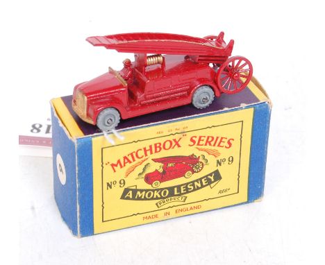 A Matchbox 1/75 series No. 9A Dennis Fire Escape engine comprising red body with gold detailing and metal wheels, in the orig