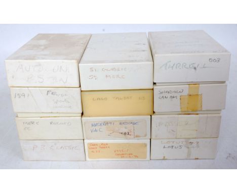 12 various plastic boxes containing various 1/43 scale white metal and resin plastic car kits, spare parts and accessories, t
