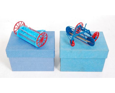 Two boxed Cenfyn Davies 1/32 scale white metal and resin farm attachment, items to include side rake (seat broken but apparen