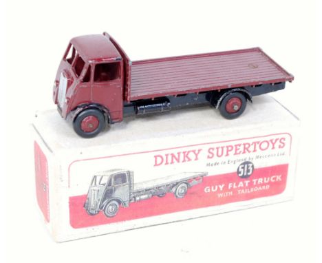 Dinky Toys, 513, Guy Flat Truck, maroon cab and back with black chassis and maroon hubs, in a reproduction box (G-BR)