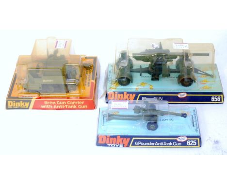 Three various bubble packed Dinky Toy military diecasts to include No. 656 88mm gun, No. 619 bren gun carrier with anti-tank 