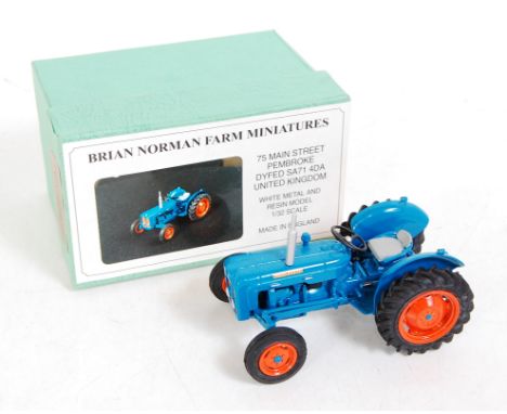 A Brian Norman farm miniatures 1/32 scale white metal and resin model of a Fordson Dexta 3 cylinder diesel tractor, model No.