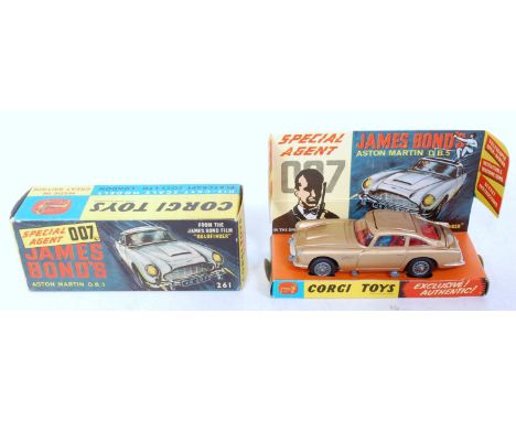 A Corgi Toys No. 261 James Bond Aston Martin DB5 comprising gold body with red interior, James Bond driver figure and bandit 