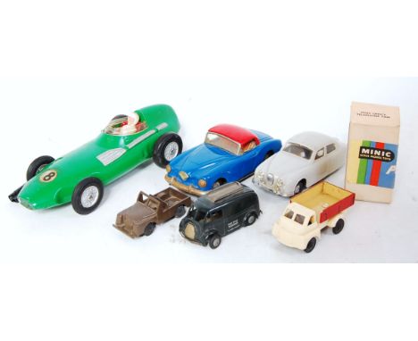 A collection of tinplate plastic and large scale diecast boxed and loose items to include a Triang Minic boxed telephone van,