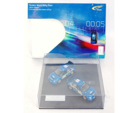 A Pro-Drive 1/43 scale Subaru New Zealand Joint Set World Rally Team gift set with Subaru car key ring, all housed in the ori