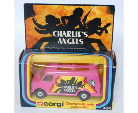 A Corgi Toys No. 434 Charlie's Angels custom delivery van comprising yellow body with amber glass and detailed interior with 